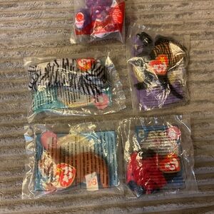 Lot of 5 McDonald’s toys unopened 4 Ty from 2000 and 1 build a bear from 2015.